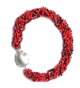 One of my favorite pieces using baby Huayruros!